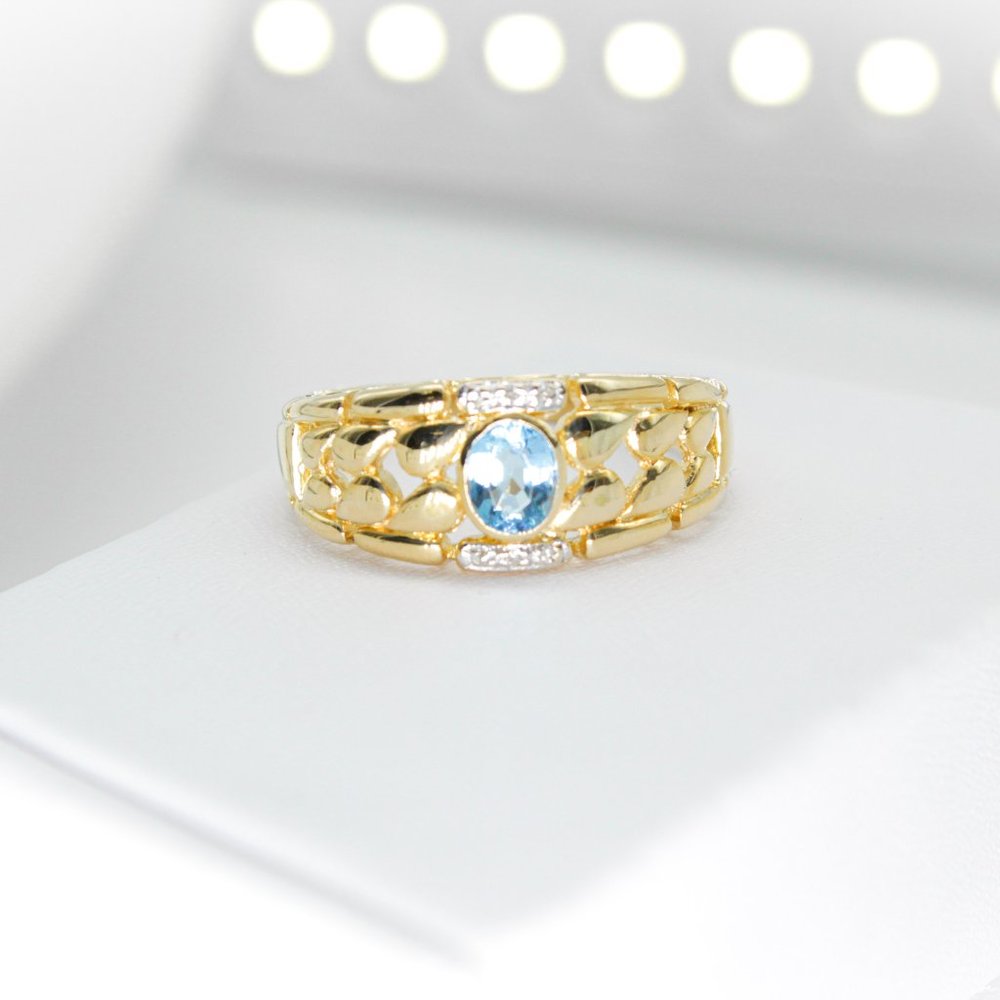 14kt Yellow Gold Ring with Genuine Blue Topaz and Diamonds - CW709BT
